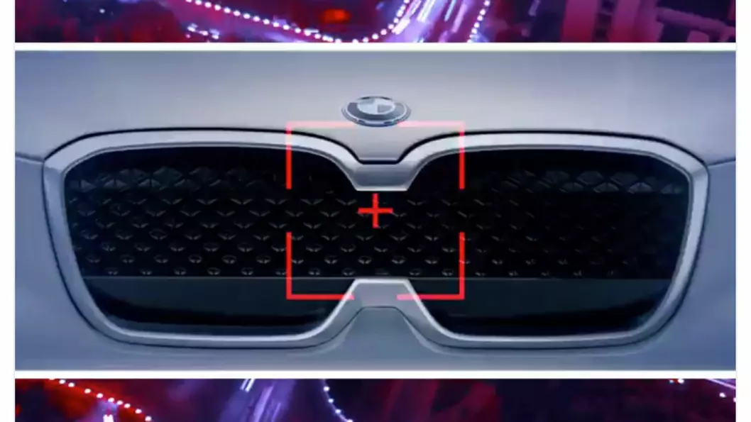 SNIKTITT: Så mye, men ikke mer, har BMW vist fram av konseptbilen iX3. På Beijing-utstillingen kommer doningen i helfigur.