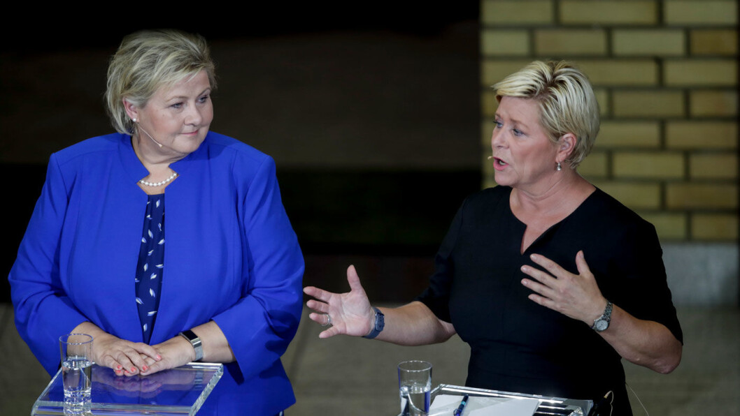 NYTT BUDSJETT: Finansminister Siv Jensen (Frp) sier det er ingen grunn til bekymring til at CO2-avgiften i seg selv vil føre til høyere drivstoffpriser, her med regjeringssjef Erna Solberg på valgkvelden. Foto: Vidar Ruud / NTB scanpix NYTT BUDSJETT: Finansminister Siv Jensen (Frp) sier det er ingen grunn til bekymring til at CO2-avgiften i seg selv vil føre til høyere drivstoffpriser, her med regjeringssjef Erna Solberg på valgkvelden. Foto: Vidar Ruud / NTB scanpix